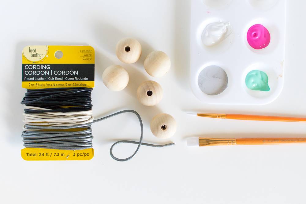 Cord, beads and paint for making crafts.
