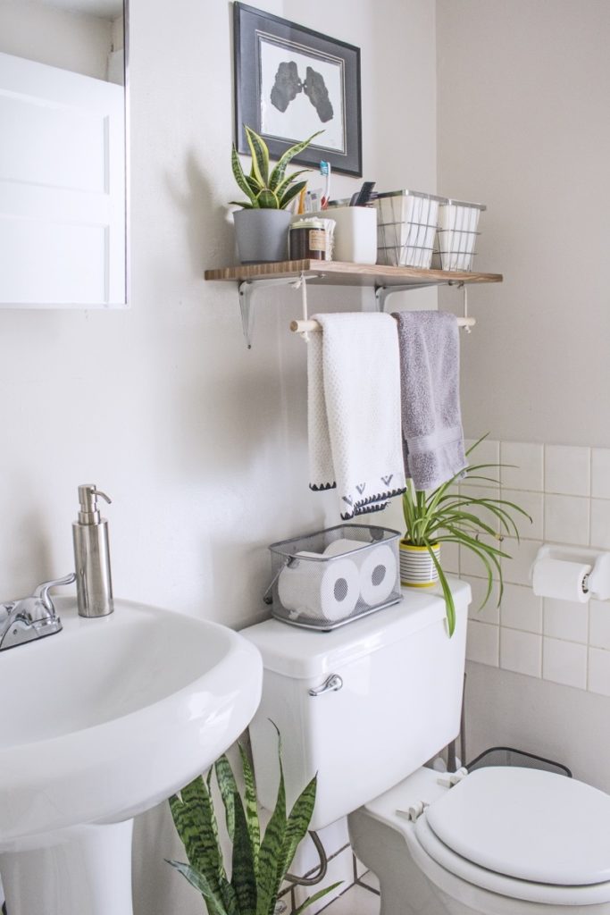 Apartment bathroom solutions: Use contact paper to dress up ugly shelving