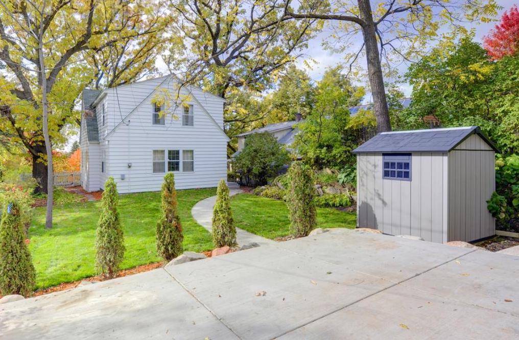 Back yard with parking pad and shed, new sod