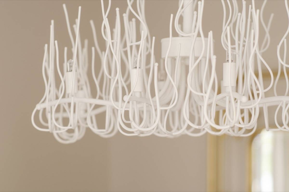 Wiry white metal chandelier