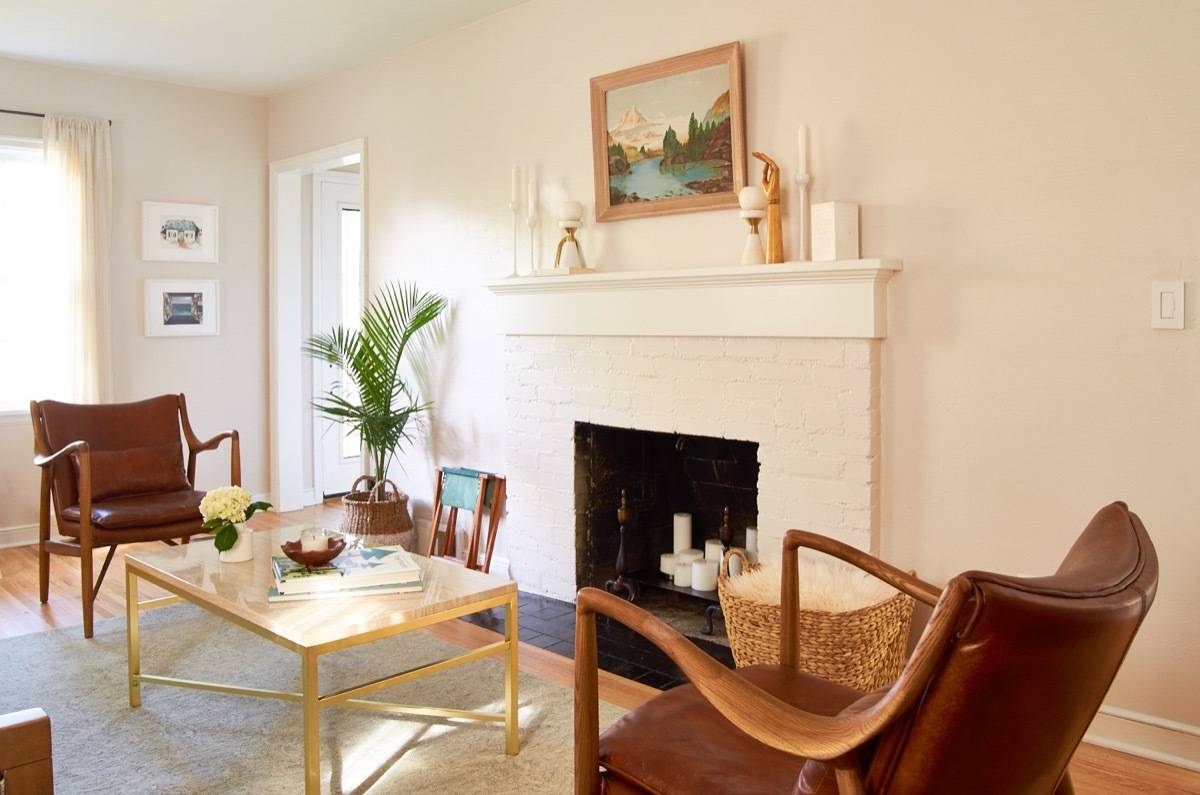 MCM leather chairs with styled fireplace