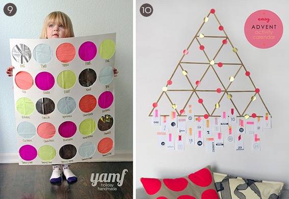 A little blonde girl holding a large poster board with colored circles on it and a triangle with six triangles inside of it with pink circles on it on a wall above a grey pillow with big red circles on it.