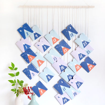 Paper printable advent calendar with mountains and stars