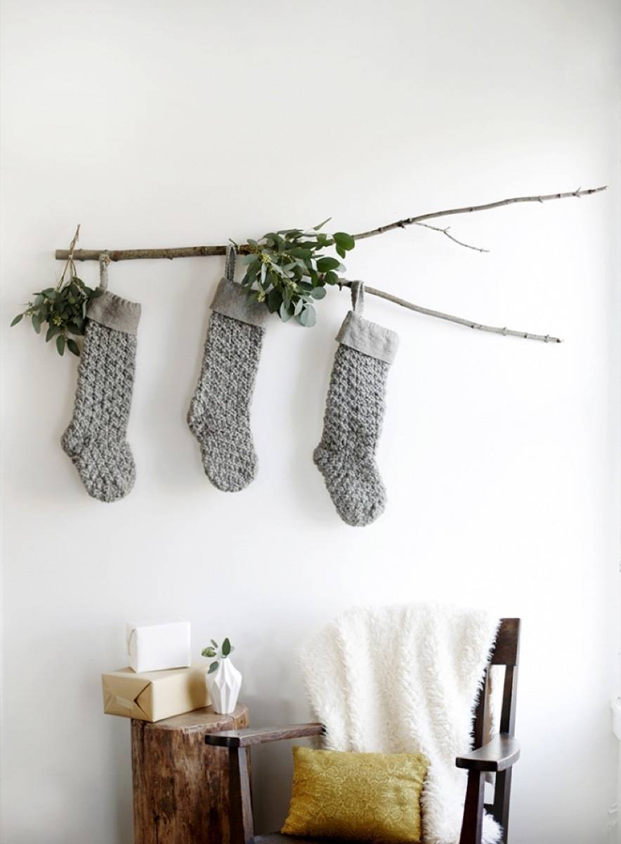 Christmas stockings hanging from a branch