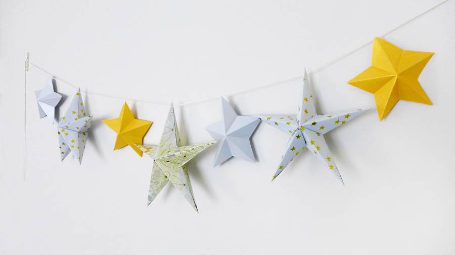 Paper stars hang from a line.