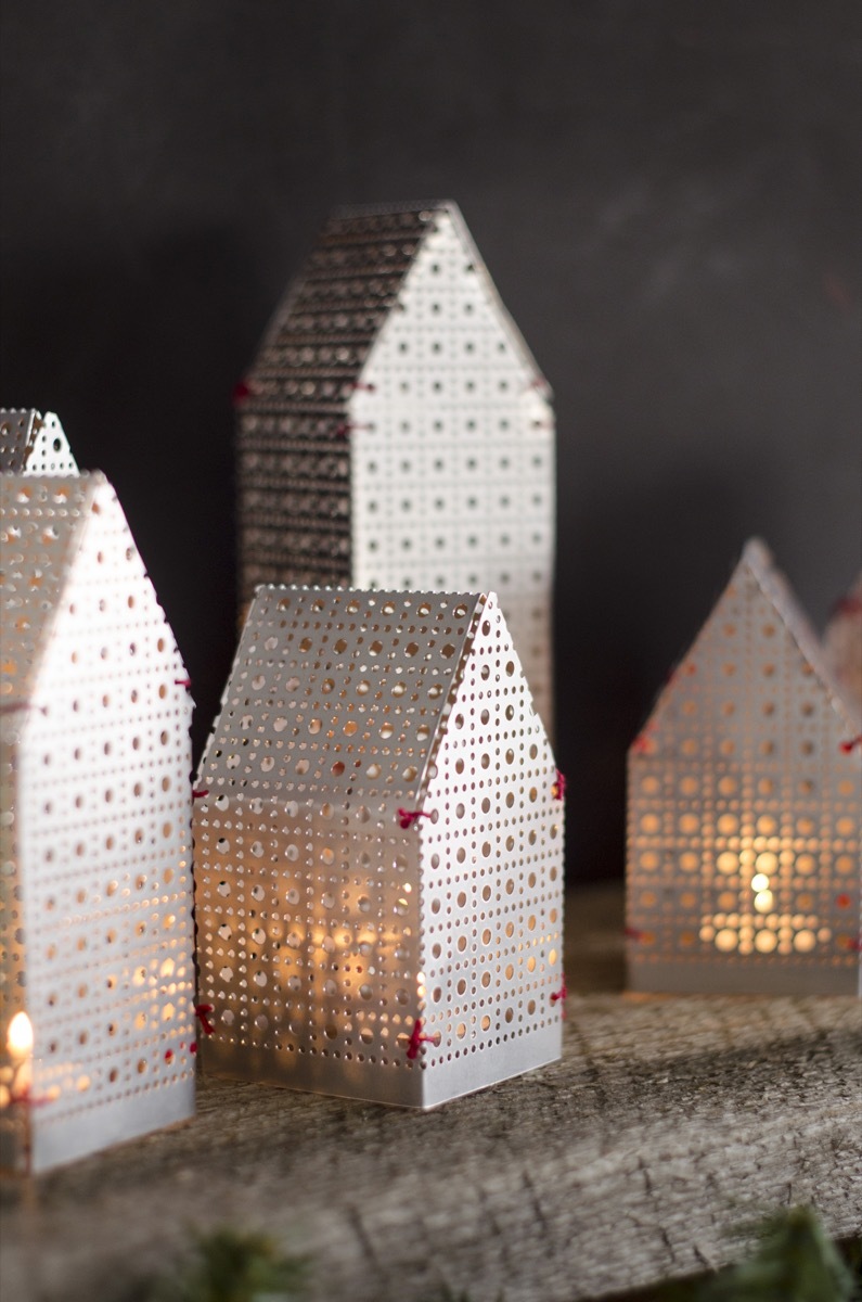 DIY holiday luminaries made from an aluminum sheet and thread