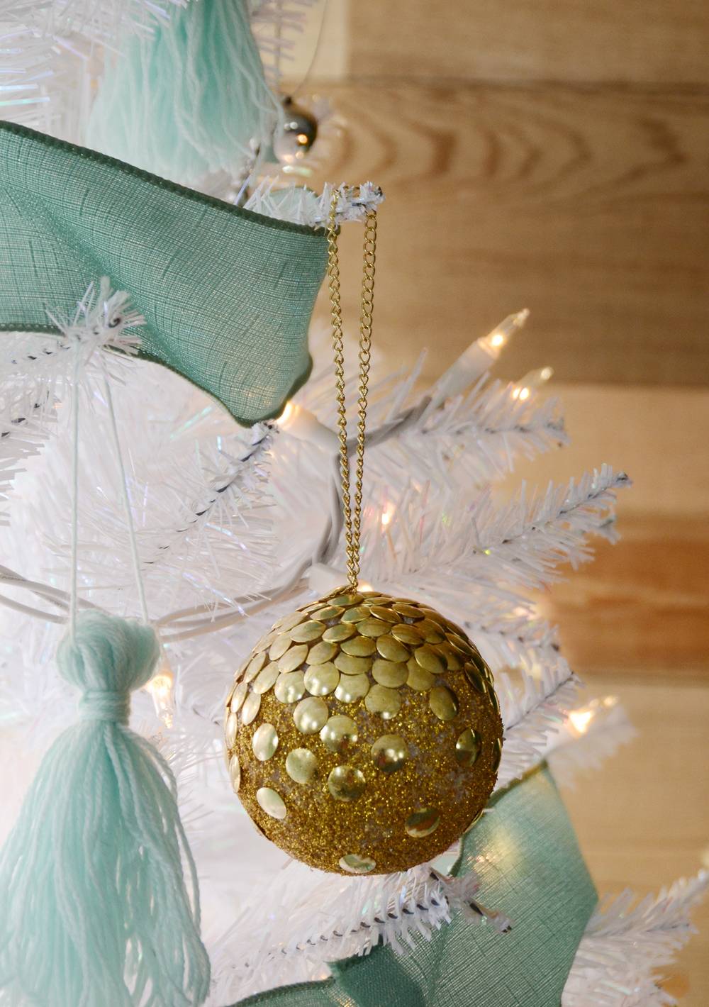 Gold thumb tack ornament