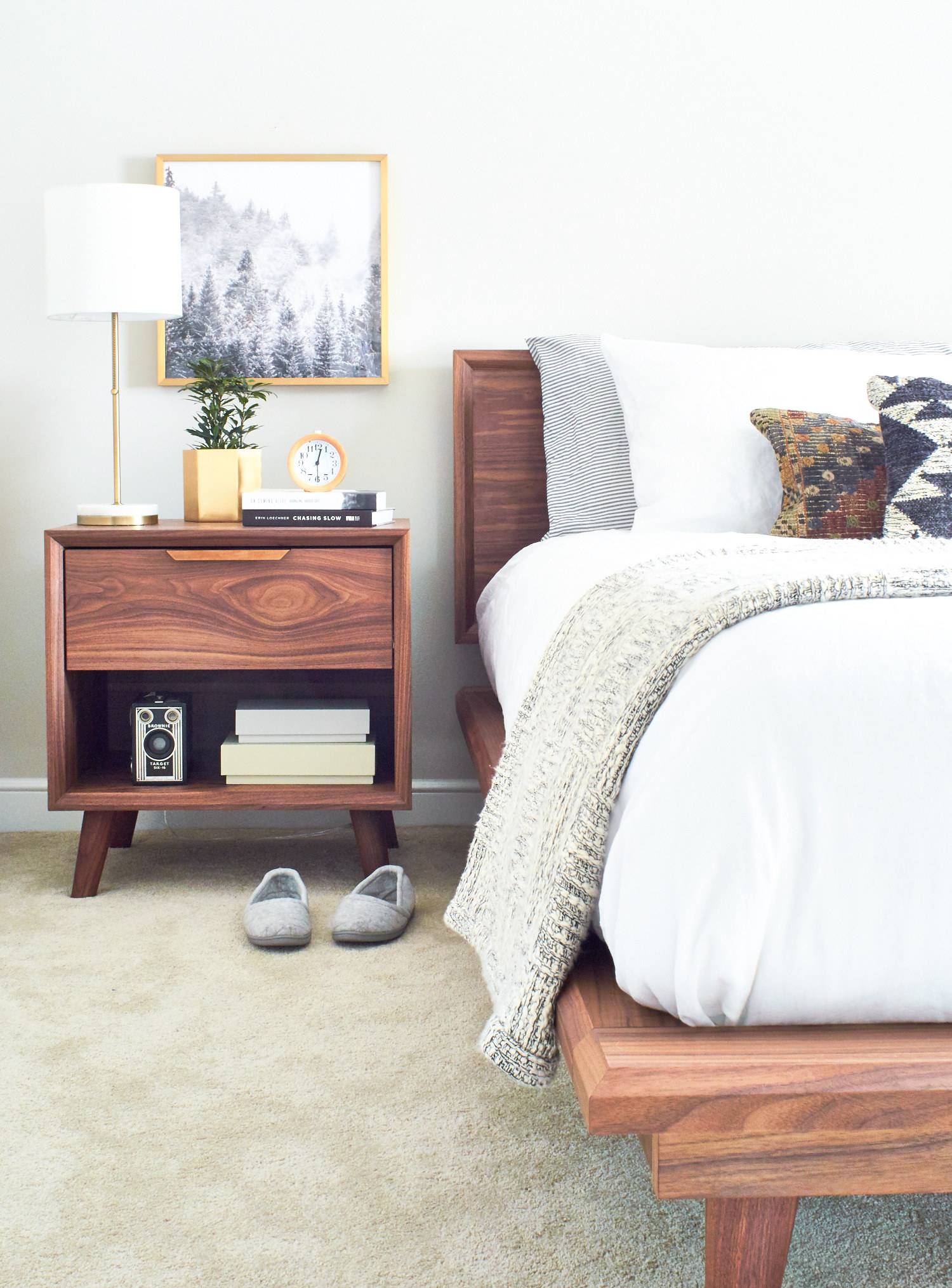 Beautiful wood end table with matching wooden platform bed.