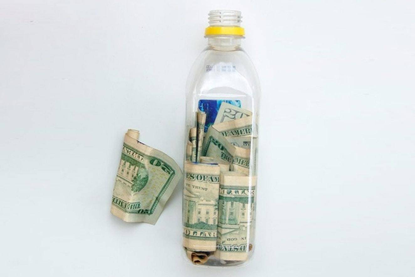 money some in the bottle with one note is left outside