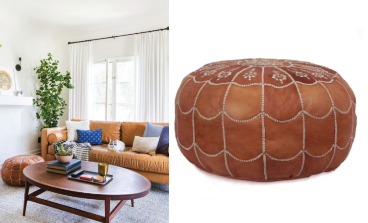 Small room decorated with a brown couch and pouf behind a wooden coffee table.