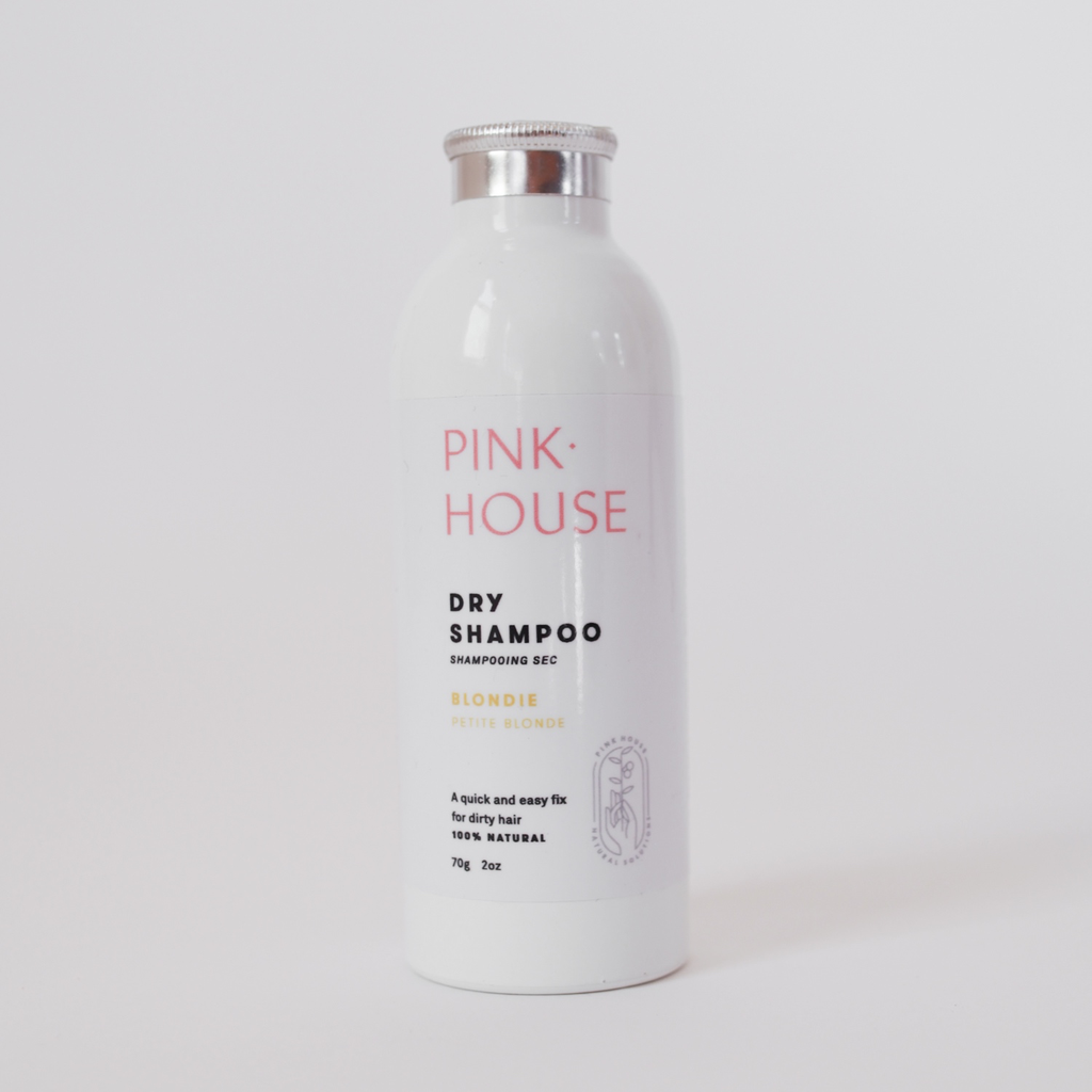 Bottle of shampoo named pink house