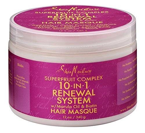 A round container of hair masque product with a purple label and gold lettering.