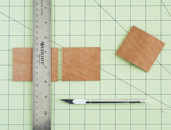 A ruler is spread out over a gridded cutting board.