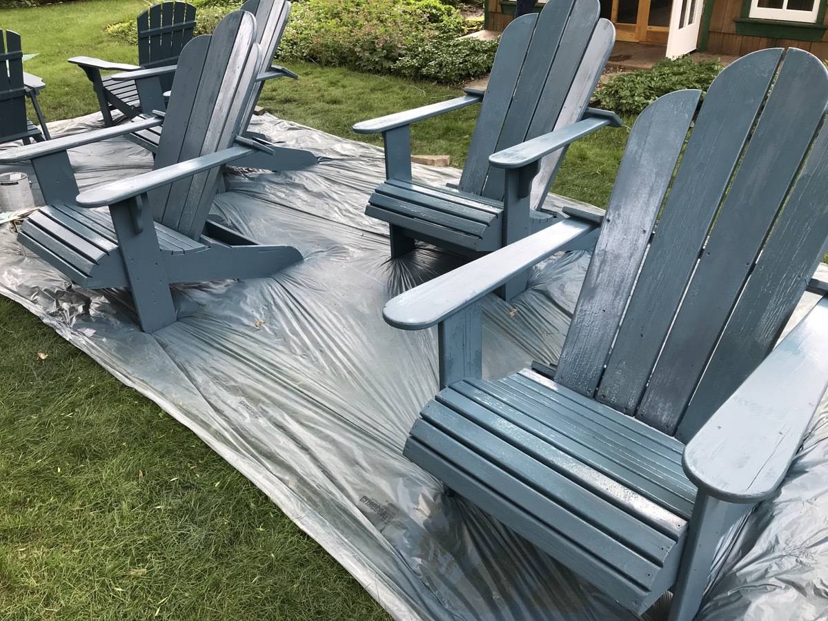 Freshly-painted Adirondack patio chairs