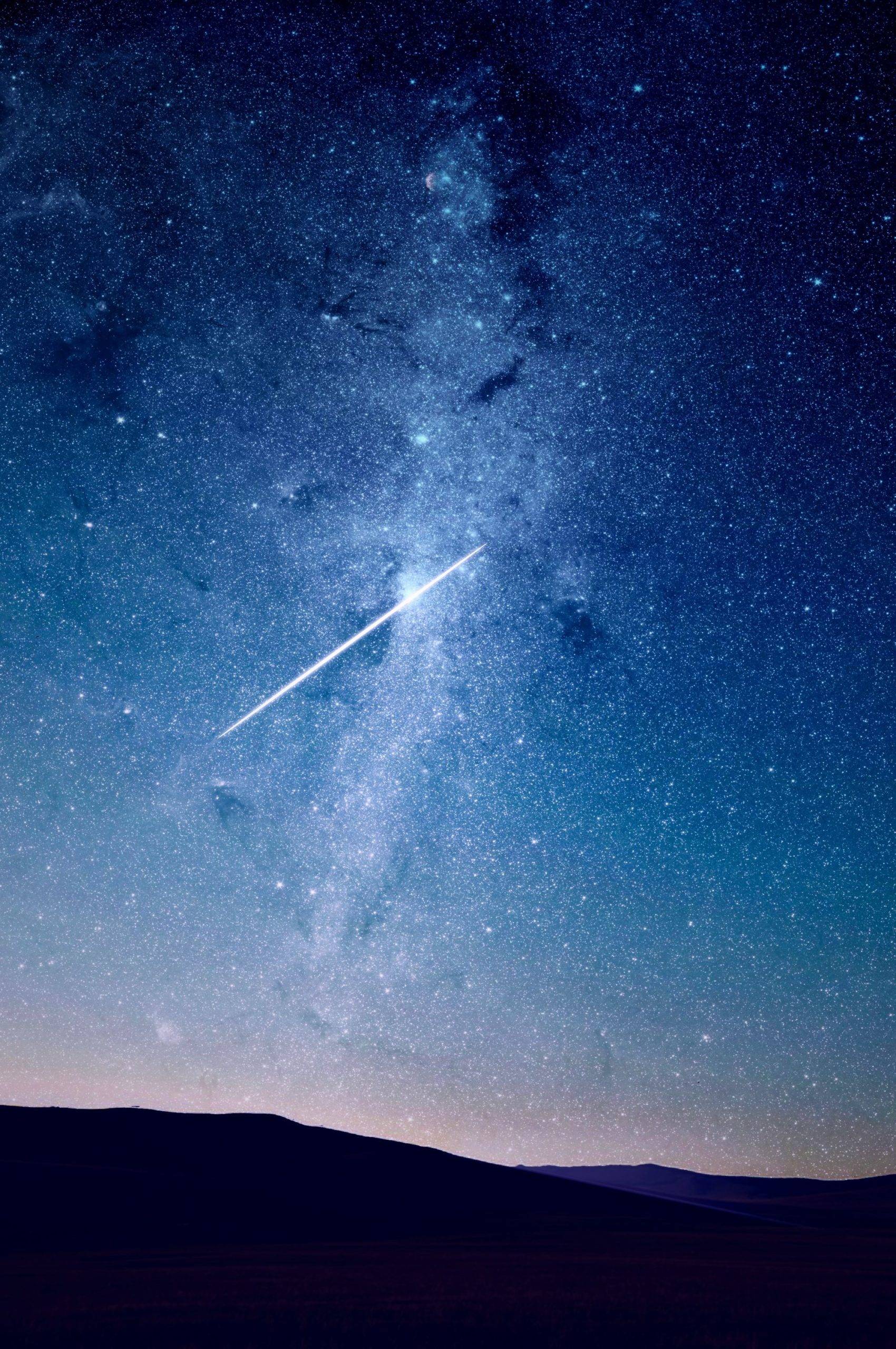 Spotting a meteor in a starry night sky is a summer activity that you should make sure not to miss out on. #summer #stargazing #stars #meteors