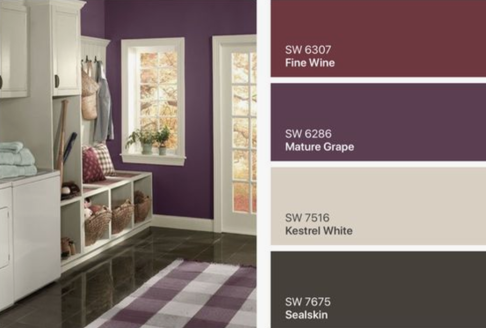 A kitchen nook with red and purple colors.