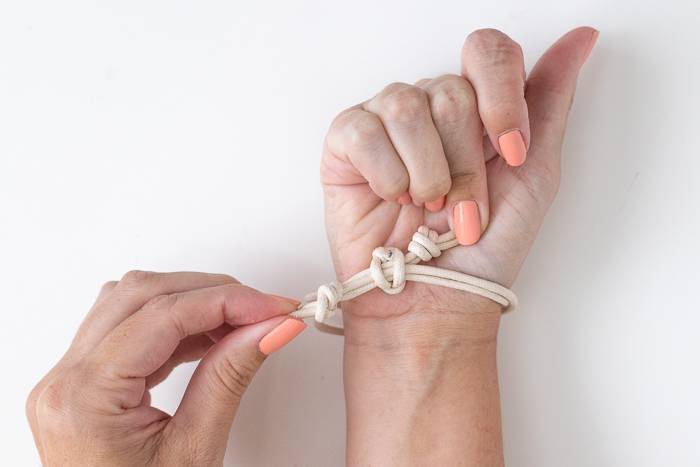How to put on a DIY knotted bracelet
