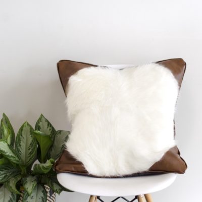 DIY fur pillow with leather accents