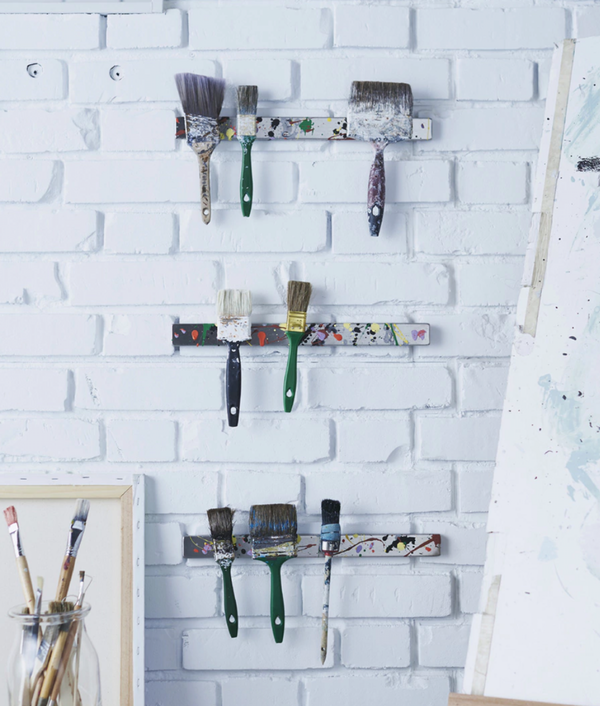 Store paint brushes on magnetic knife strips