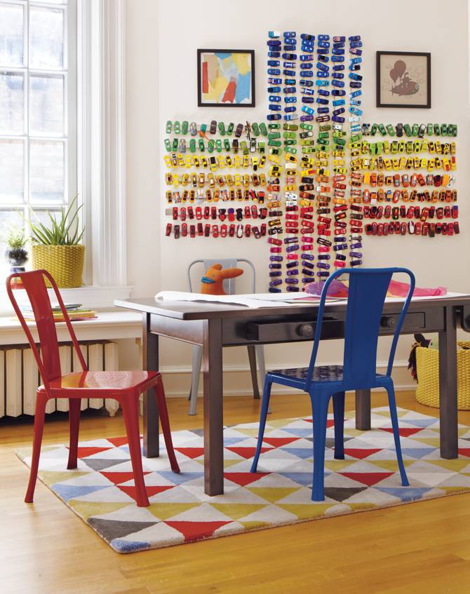 Use magnetic knife strips to create a wall mural out of toy cars