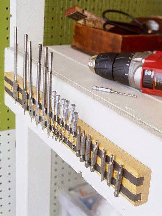 Use a magnetic knife strip to organize drill bits