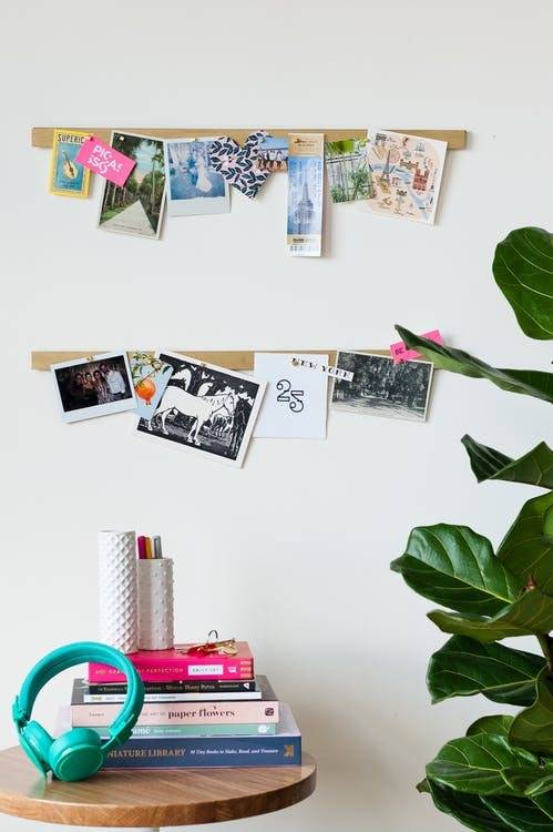 Use a magnetic knife strip to display photos and art