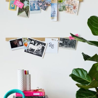 Use a magnetic knife strip to display photos and art