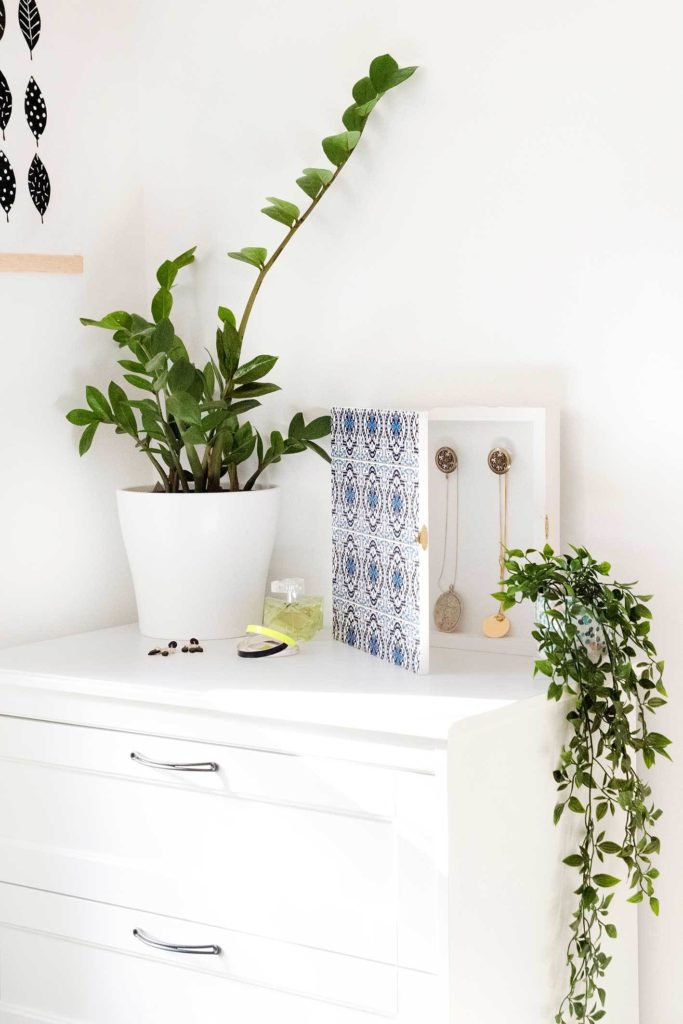 Make a jewellery organiser that's cleverly disguised as wall art!