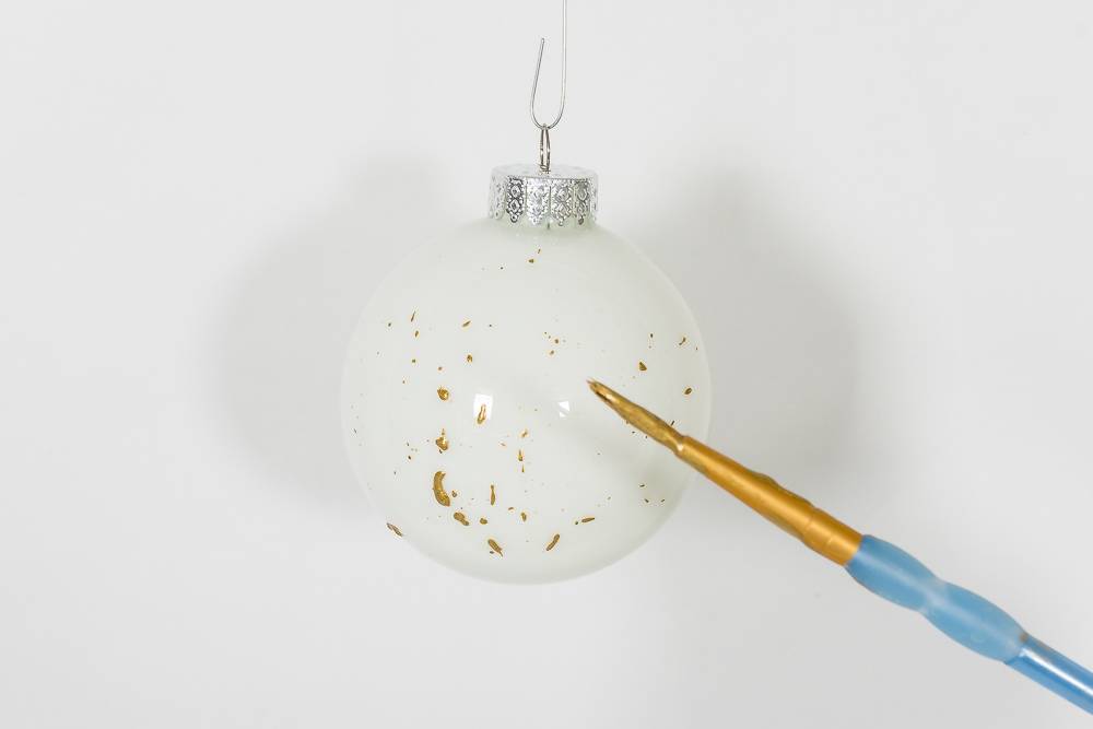 Gold splatter-painted ornaments