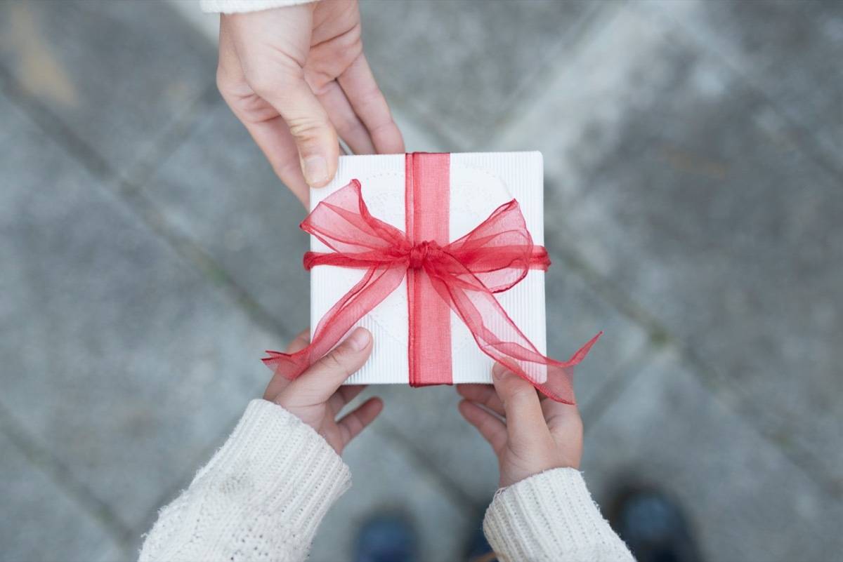 Parent hands over gift