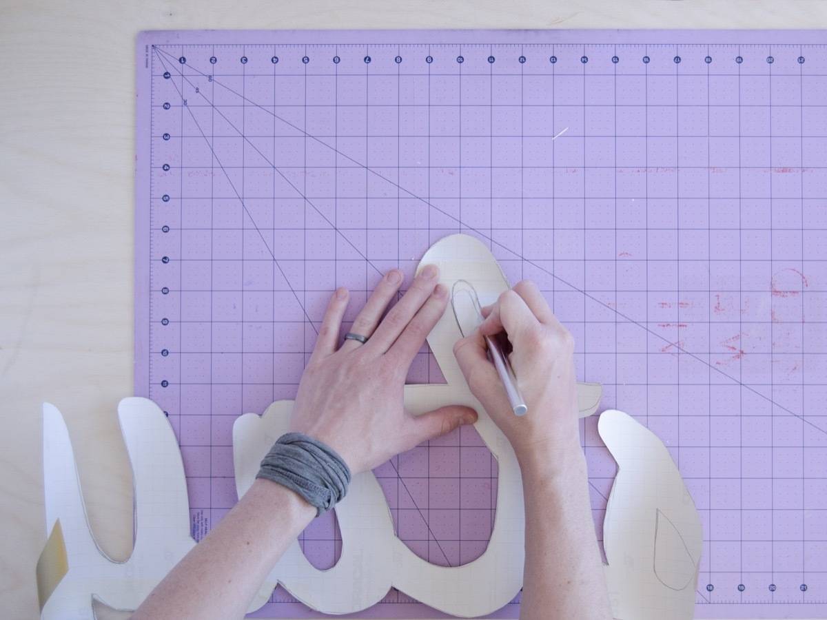 Using vinyl, a projector, and an x-acto knife, you can create a unique vinyl wall decal