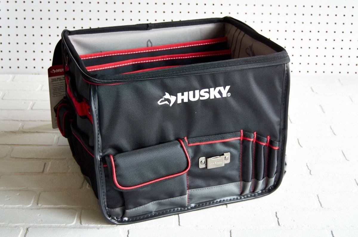 A black Husky insulated bag with red accents.