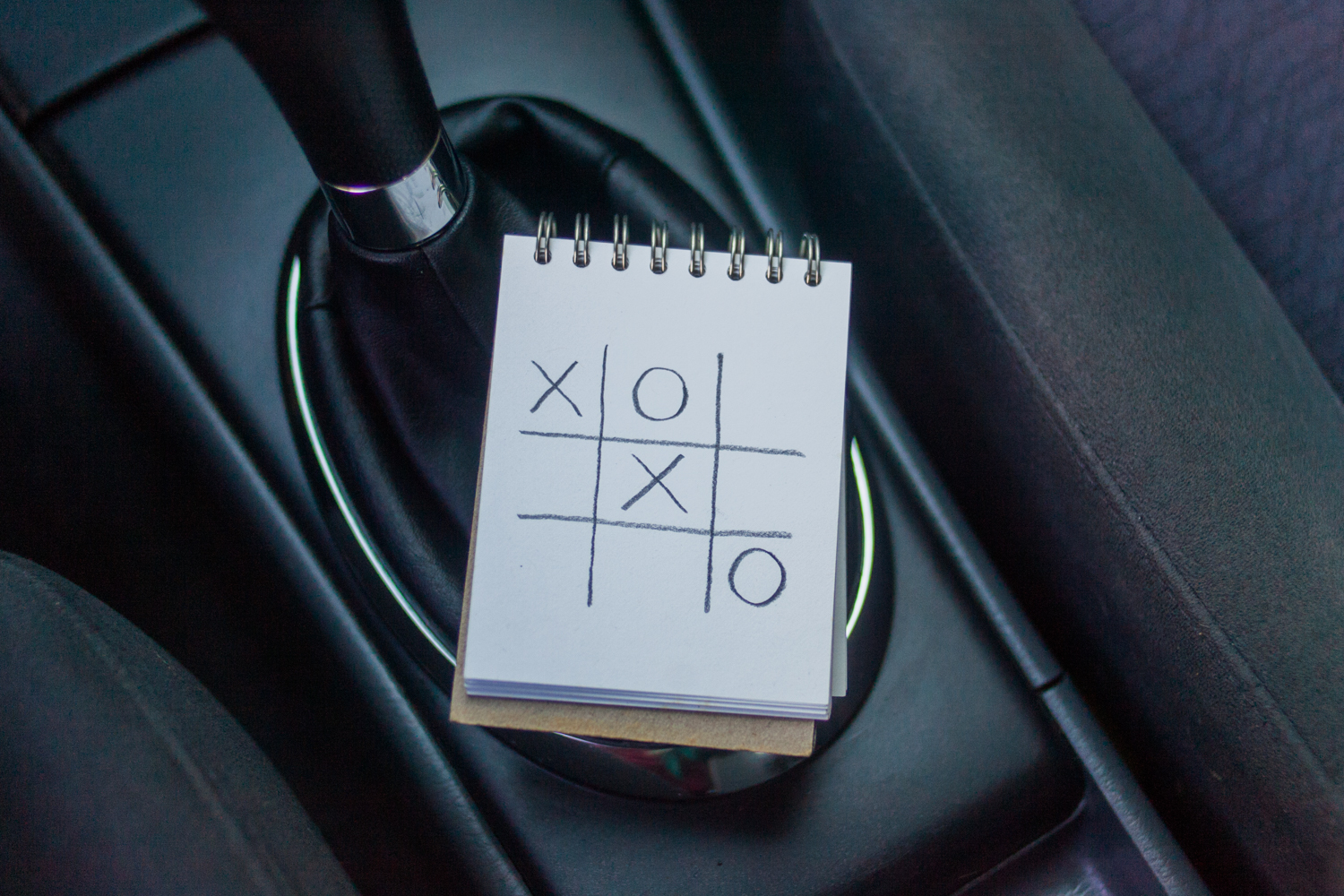 Road trip games: playing tic-tac-toe in the car.