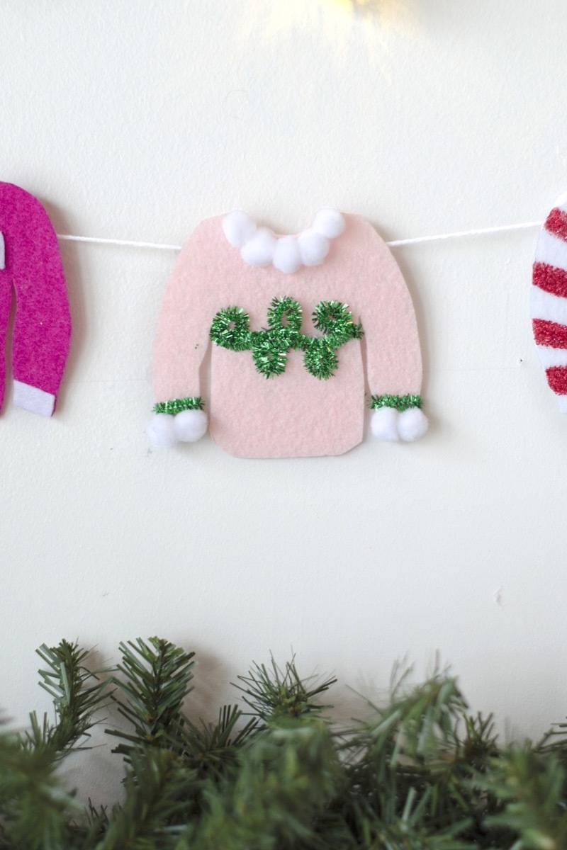 Detail shot of tacky Christmas sweater garland project