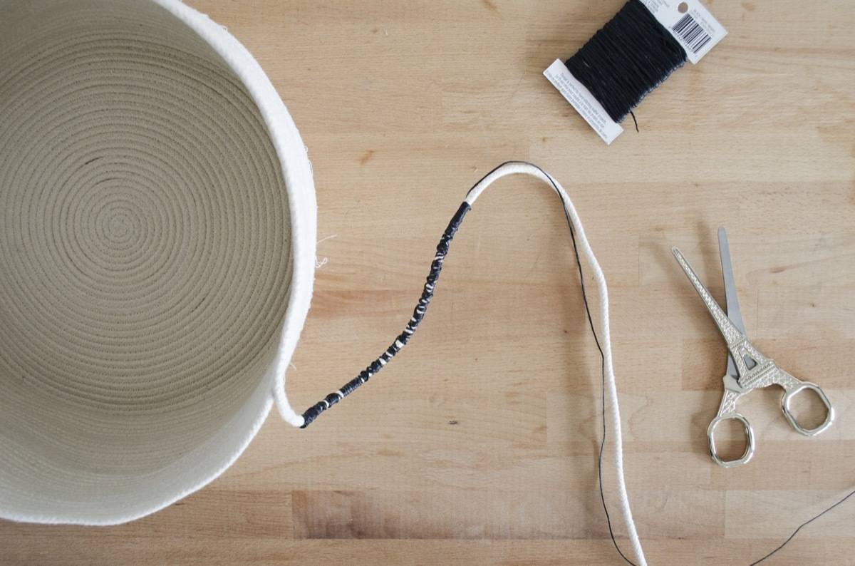 Use thread or floss to wrap your cording as you go to create stripes in your clothesline basket.