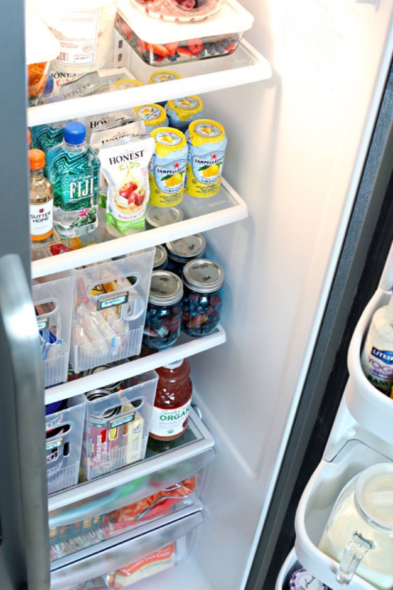 Organize the fridge with bins | 72 Organization Tips and Projects for Every Space in Your Home
