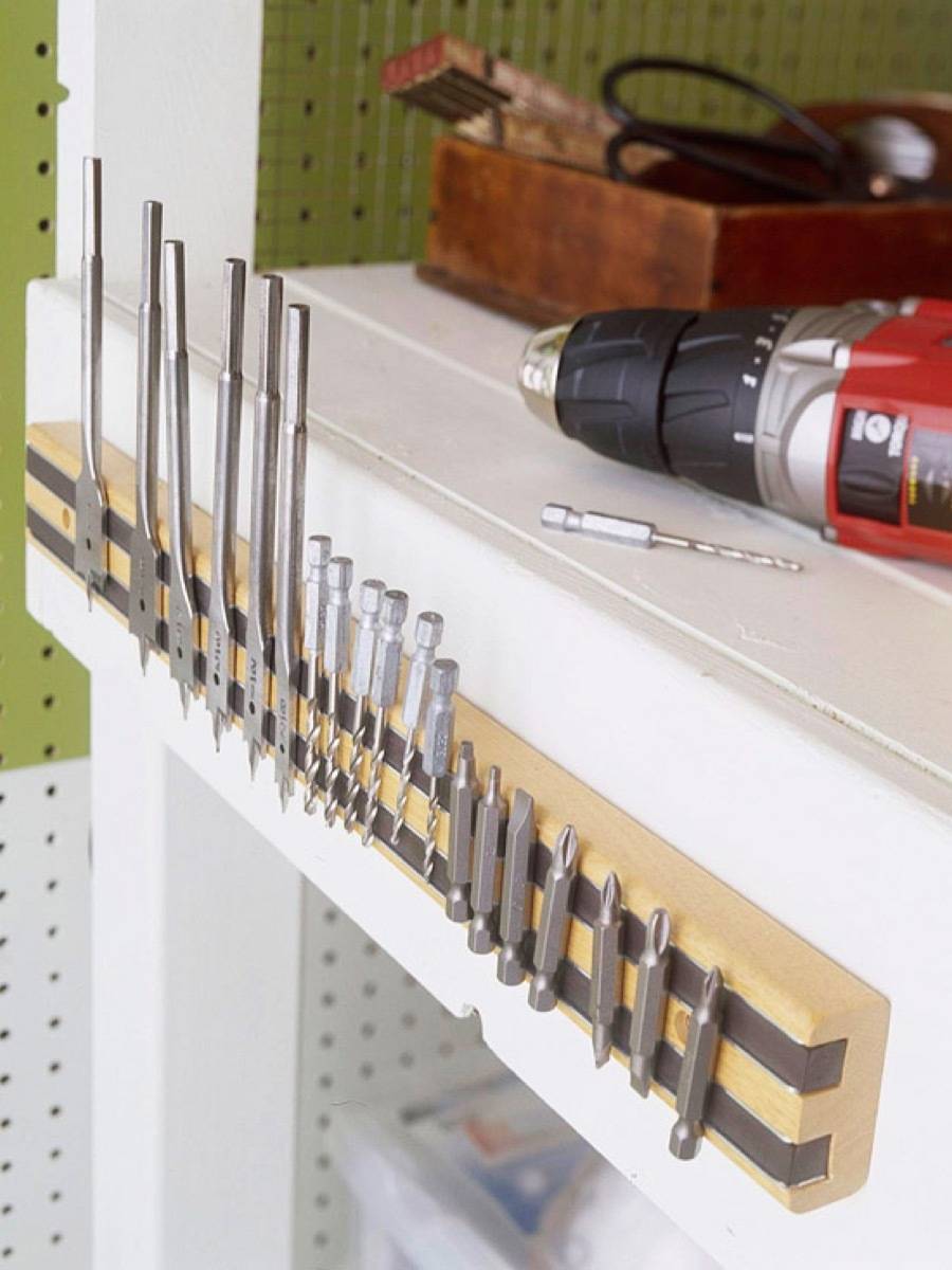 A magnetic knife rack is a great solution for keeping track of drill bits | 72 Organization Tips and Projects for Every Space in Your Home