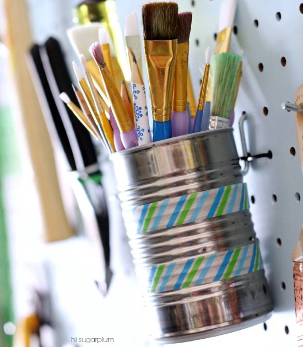 Use tin cans to organize supplies | 72 Organization Tips and Projects for Every Space in Your Home