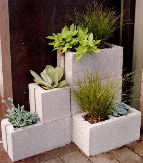 Cement bricks stacked up and used as planters.