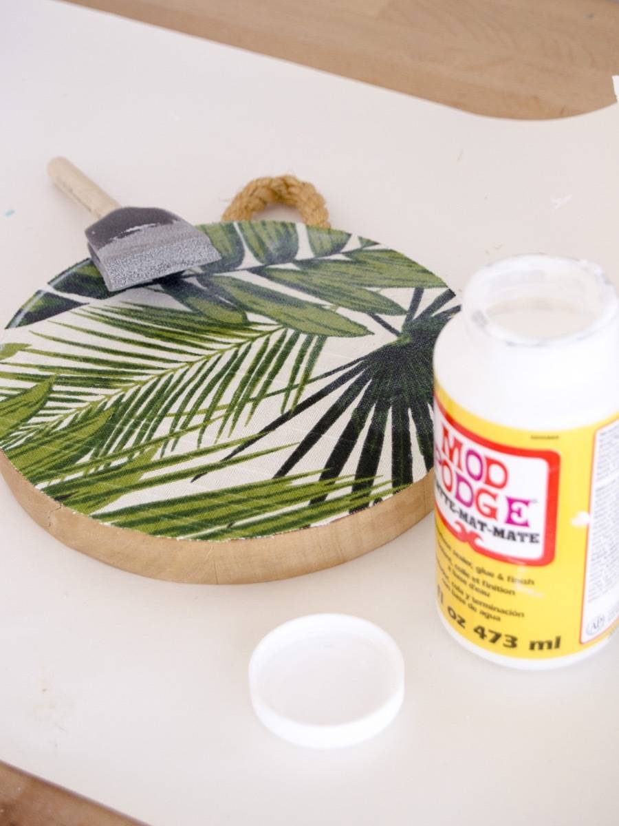 Decoupaged wooden trivet becomes part of our cheap gallery wall