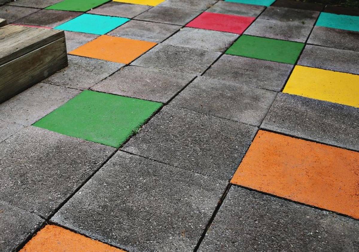 62 DIY Projects to Transform Your Backyard: Colorful patio tiles