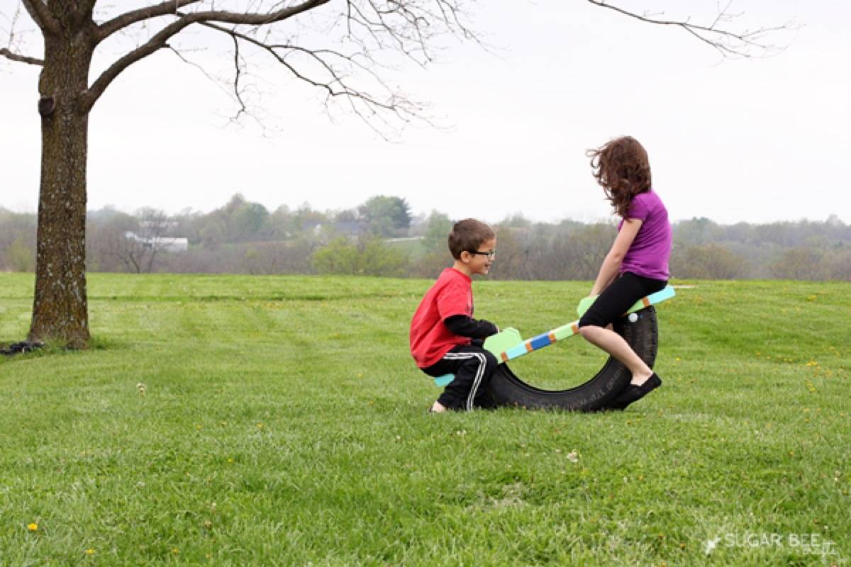 62 DIY Projects to Transform Your Backyard: Recycled Tire Teeter Totter