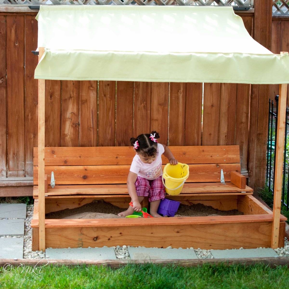 62 DIY Projects to Transform Your Backyard: Sandbox with seating and awning