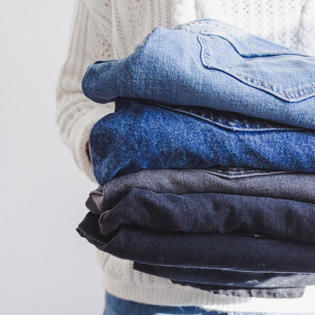 stack of folded jeans