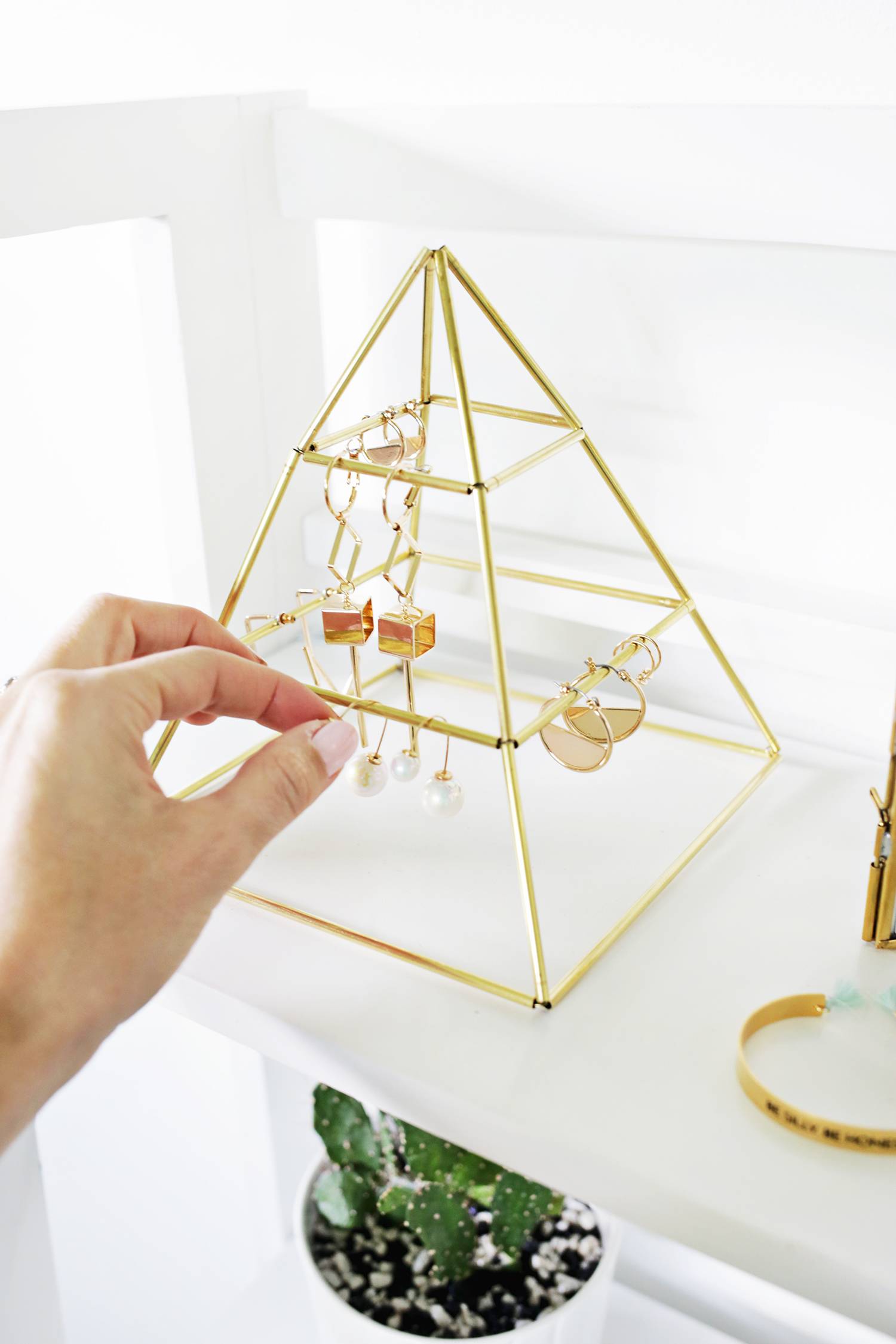 Brass pyramid earring display