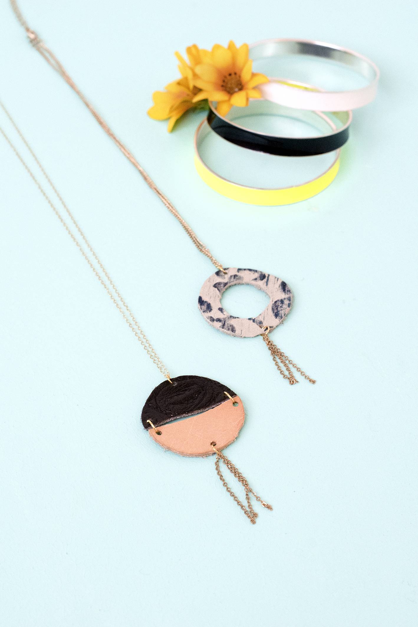 Circular leather pendants on a chain