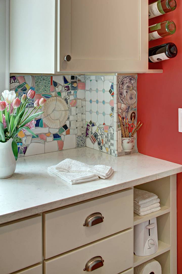 Creative and colorful mosaic kitchen backsplash