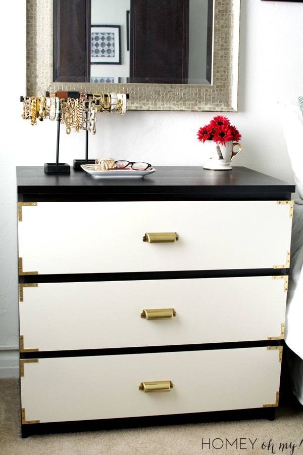 White dresser with plants sitting on top