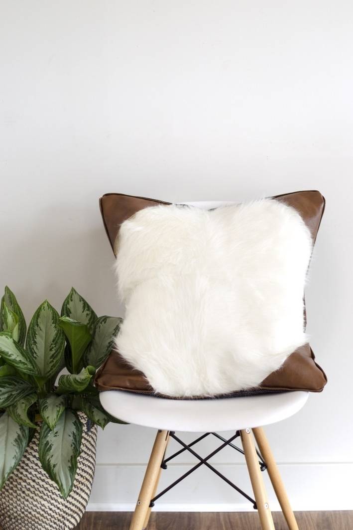 Faux fur and faux leather pillow