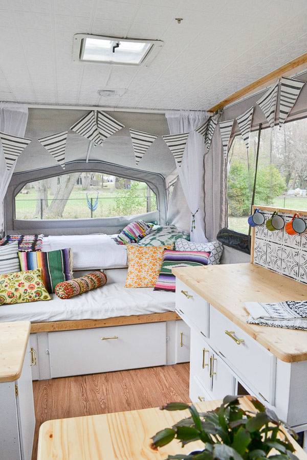 A clean and organized well decorated camper.